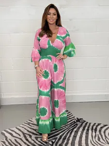 Full-length V-neck pink and green tie-dye print wide-leg jumpsuit with ruffled bell sleeves