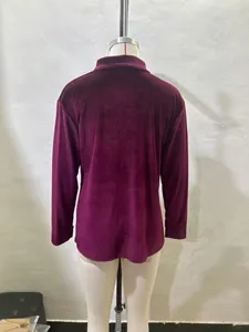 Back view of a minimalist loose-fit long sleeve burgundy gold velvet shirt for women.