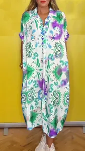 Casual loose maxi dress with green and purple paisley print on a white background