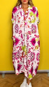 Stylish paisley print loose-fit shirt dress with a classic lapel collar detail.