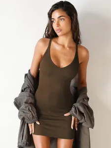 Elegant close-up of a ribbed dark brown bodycon mini dress featuring a deep V-neckline