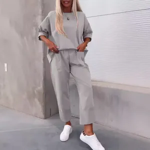 Minimalistisches einfarbiges Langarm-Zweiteiler-Set mit Rundhalsausschnitt und Taschen