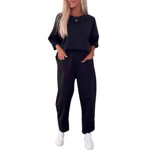 Lässiges Damen-Zweiteiler-Set mit Langarmshirt und Taschenhose in Schwarz