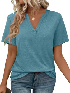 Close-up detail of women's blue V-neck short sleeve T-shirt with textured fabric