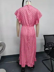 Detailed back view of a pink printed vacation maxi dress featuring ruffle sleeves