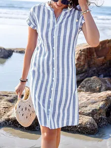 Stylish women's blue and white striped button-down shirt dress for beach vacation