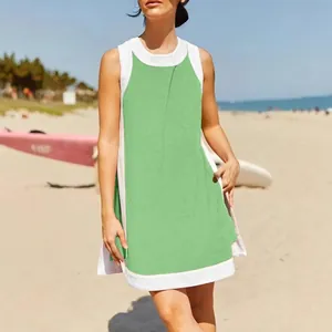 Stylish women's summer color-block sleeveless top and shorts set in vibrant green