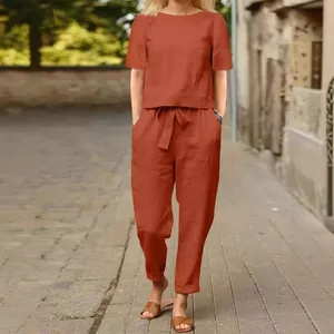 Women's cotton linen two-piece set with short sleeve top and wide leg pants in rust orange