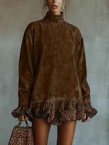 Detailed view of a high-neck velvet brown dress featuring stylish leopard print ruffle hem and cuffs.