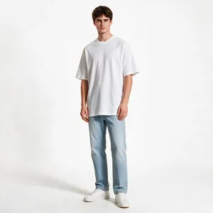 Full view of model wearing a white heavyweight oversized cotton crew neck t-shirt