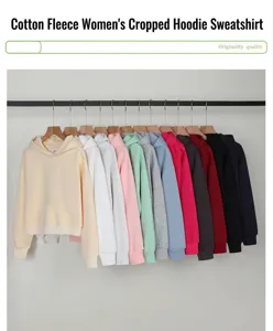Selection of colorful women's cropped hoodies in premium cotton displayed on a clothing rack.