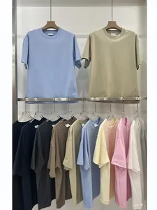 Heavyweight 280g cotton loose fit T-shirts in various solid colors on a display rack