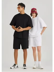 Unisex oversized βαμβακερό T-shirt και σορτς με πεσμένους ώμους σε μαύρο και λευκό