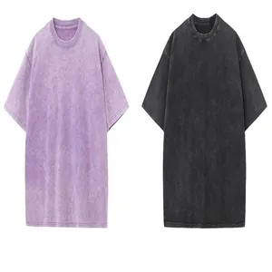 Detail of oversized cotton T-shirts in purple and black with vintage snow wash texture