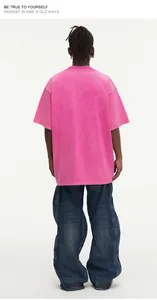 Macro view showing the back of a heavy 300g pink distressed washed cotton T-shirt