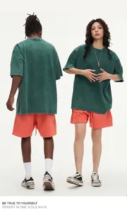 Front and back view of oversized vintage washed heavyweight cotton T-shirt on models