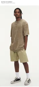 Heavyweight 300g oversized washed cotton T-shirt with retro distressed snowflake effect