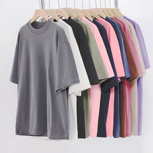 Detailed view of multiple colors of washed distressed 260g heavy cotton oversize t-shirts