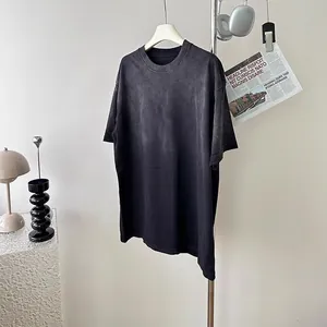Detailed view of a heavyweight 250g washed black gradient cotton T-shirt, oversized fit