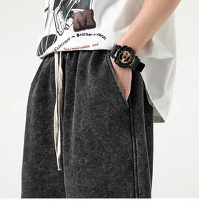 Close-up view of vintage stone-washed 290g cotton sweat shorts featuring an elastic waist