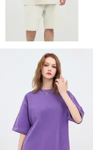 Detail view of purple washed distressed cotton oversized T-shirt with vintage faded finish