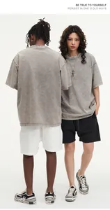 Back and front view of heavyweight oversized washed cotton t-shirt with acid wash effect