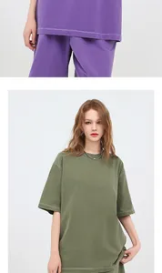 Detail view of washed vintage oversize 260g cotton t-shirt in olive green and purple