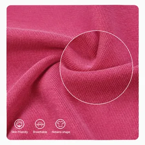 Close-up of pink ribbed fabric detail on an acid washed cropped T-shirt for women.