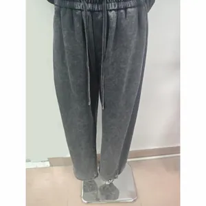 Heavyweight washed distressed sweatpants with loose fit and retro streetwear style