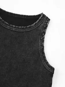 Close-up detail of vintage acid wash ribbed tank top with distressed edges.