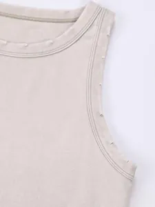 Detail of vintage washed tank top showing distressed neckline and armhole stitching
