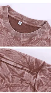 Gros plan d'un sweat-shirt marron délavé à l'acide montrant le col et l'épaule