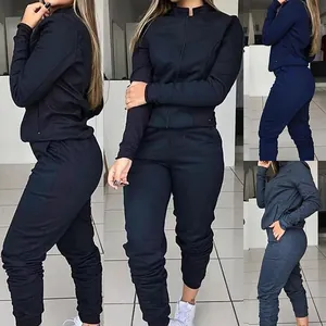 Detailed views of women's two-piece tracksuit available in black, navy, and charcoal colors