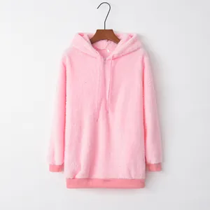 Solid pink soft fuzzy fleece hooded sweatshirt with half-zip front and long sleeves for women