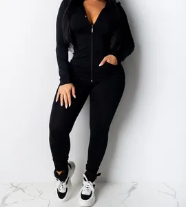 Premium black two-piece sports set featuring a slim-fit zip-up hoodie and matching leggings
