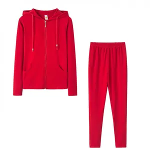 Front view of solid red two-piece tracksuit with zip-up hoodie and matching pants.