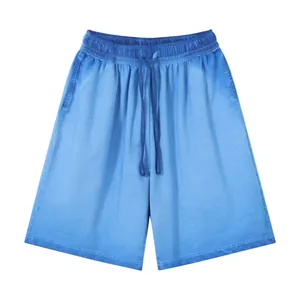 Vintage washed gradient cotton jersey shorts in light blue with drawstring waist