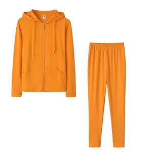 Front view of bright orange two-piece hooded zip-up sweatshirt and matching pants