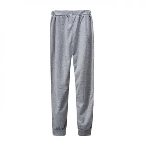 Vista dettagliata dei pantaloni jogger grigi casual con vita elastica e polsini