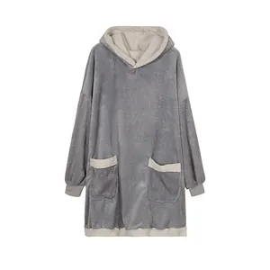 Full view of oversized grey sherpa fleece wearable blanket hoodie with large pockets