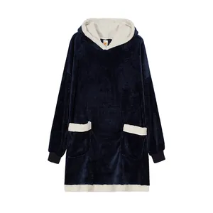 Oversized navy blue sherpa-lined wearable blanket hoodie with contrast white trim details