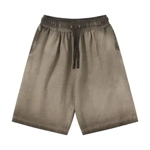 Vintage washed gradient drawstring shorts with distressed cotton finish in brown-grey hue