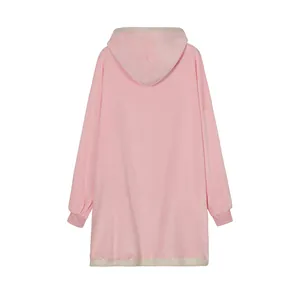 Back view of an oversized pink hooded wearable blanket in soft lamb velvet.