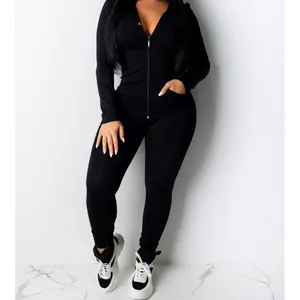 Elegant slim fit black two-piece hooded tracksuit set for women with zip-up top