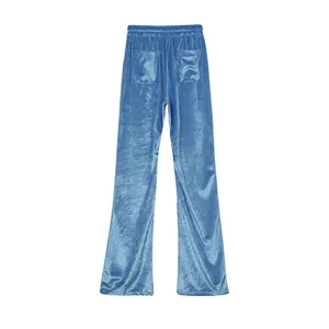 Detailed back view of light blue velvet wide-leg trousers with elastic waist and pockets