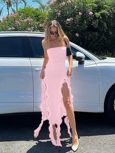 Elegant pink strapless bodycon dress featuring ruffle detail and high slit for summer fashion