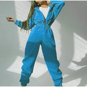 Macro view showing the stylish blue hooded one-piece tracksuit with elastic waist