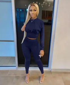 Solid navy blue long sleeve top and leggings two-piece set for fitness and casual wear