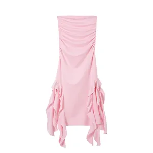 Detailed view of pink strapless bodycon dress with ruffles and shirred texture