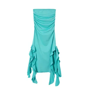 Front view of a turquoise tube dress featuring a ruched bodice and cascading ruffle hem